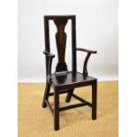 A George III mahogany child's high back chair / correction chair,