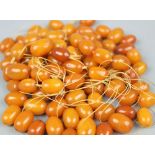 A collection of ninety six butterscotch amber beads, gross weight 81.