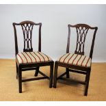 A set of six George III mahogany dining chairs,