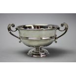 A Victorian silver twin handled pedestal bowl, Goldsmiths & Silversmiths Co Ltd, London 1900,