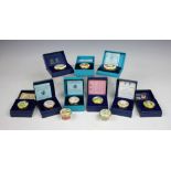 A collection of nine Halcyon Days, Bilston enamel Mother's Day and other boxes, to include; 1977,