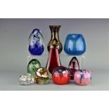 A selection of paperweights to include a Victorian dump example, 9cm high,