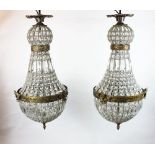 A pair of early 19th century style French cast brass and moulded glass ceiling lights,