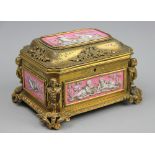 A 19th century French porcelain and gilt metal mounted casket retailed by Tahan a Paris,