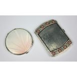 An Art Deco silver and graduated pink guilloche enamel circular compact, Mappin and Webb,