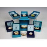 A collection of eight Halcyon Days, Bilston enamel boxes to include; two Charles and Diana examples,