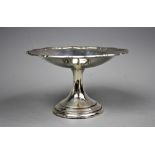 A George V silver tazza, 'B & B', Birmingham 1926, with pie crust top upon a splayed column base,