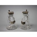 A pair of George V silver mounted glass whisky flagons, with labels, Heath and Middleton,