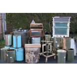 A collection of vintage bee keeping equipment, to include two spinners / honey extractor, a press,