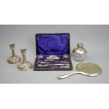 A selection of silver and silver plated wares to include an Edwardian silver mounted scent bottle,