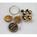 Two gold coloured Italian 1 Tallar coins dated 1853, both with soldered mounts,