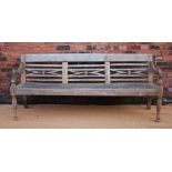 A Regency style carved teak garden / hall bench,