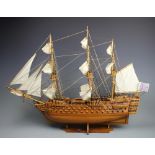 A wood built model of a three masted tall ship,