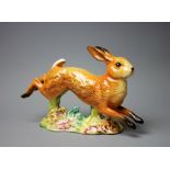 A Beswick Hare Running, no 1024, in gloss, 21.