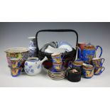 A selection of oriental wares to include a collection of Chinese rice grain porcelain rice bowls