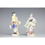 A near pair of Meissen figures, the dancers modelled mid-dance wearing floral clothes,