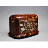 An early 19th century blond tortoiseshell two division tea caddy,