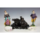 A pair of late 19th century Samson porcelain figures, of a young gentleman and lady,