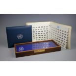 A Flags of The United Nations set of 147 silver miniature ingots,