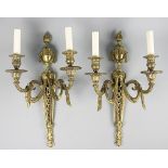 A pair of George III style gilt brass twin branch wall lights,