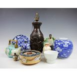 A selection of Oriental wares to include a 19th century Chinese blue and white circular plate