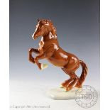 A Beswick Welsh cob (rearing), model number 1014, designed by Arthur Gredington, first version,