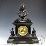 A Victorian slate and bronze figural mantle clock,