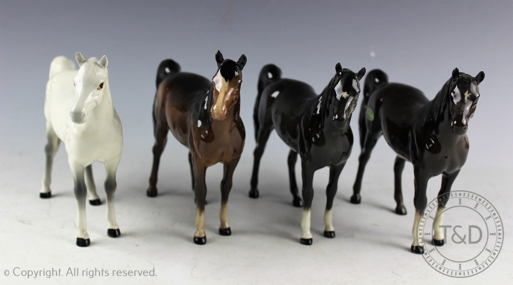 Four Beswick Arab Xayal horses, model number 1265, designed by Arthur Gredington, charcoal grey,
