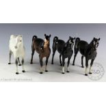 Four Beswick Arab Xayal horses, model number 1265, designed by Arthur Gredington, charcoal grey,