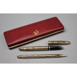 A Sheaffer imperial pattern pen and propelling pencil set,