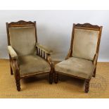 A pair of Victorian carved walnut salon chairs, one with arms,