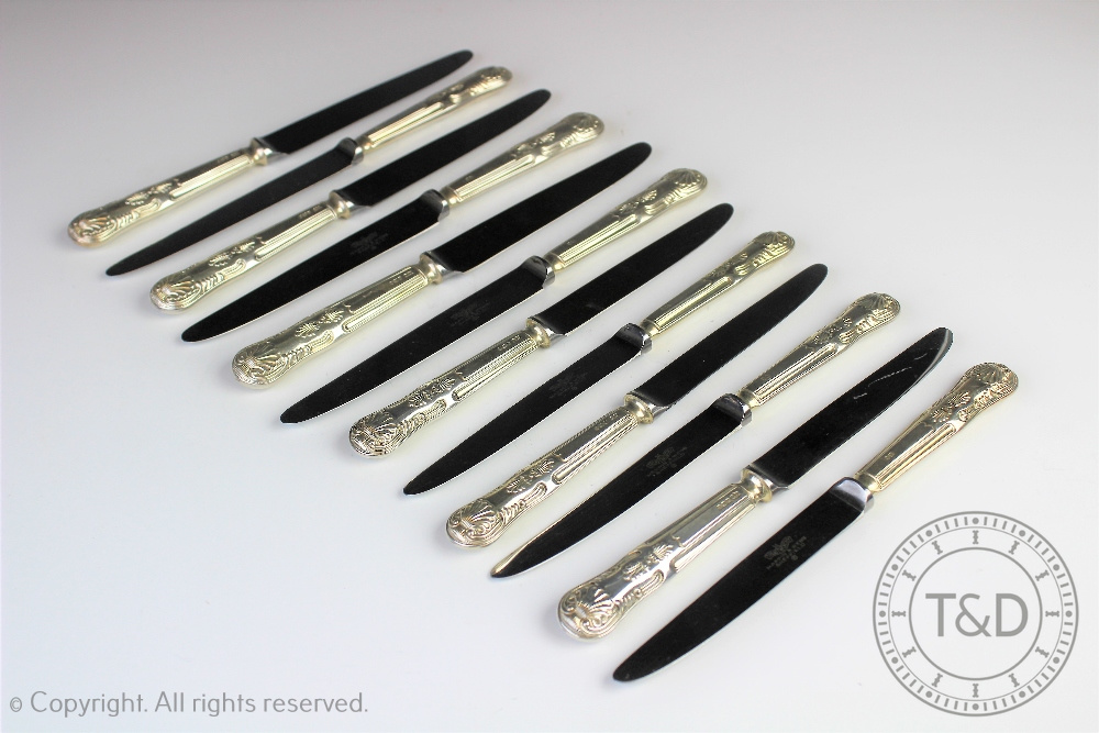 A set of six silver handled Mappin & Webb Ltd kings pattern table knives,