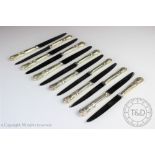 A set of six silver handled Mappin & Webb Ltd kings pattern table knives,