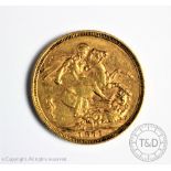 A Victorian gold sovereign dated 1871, London Mint,