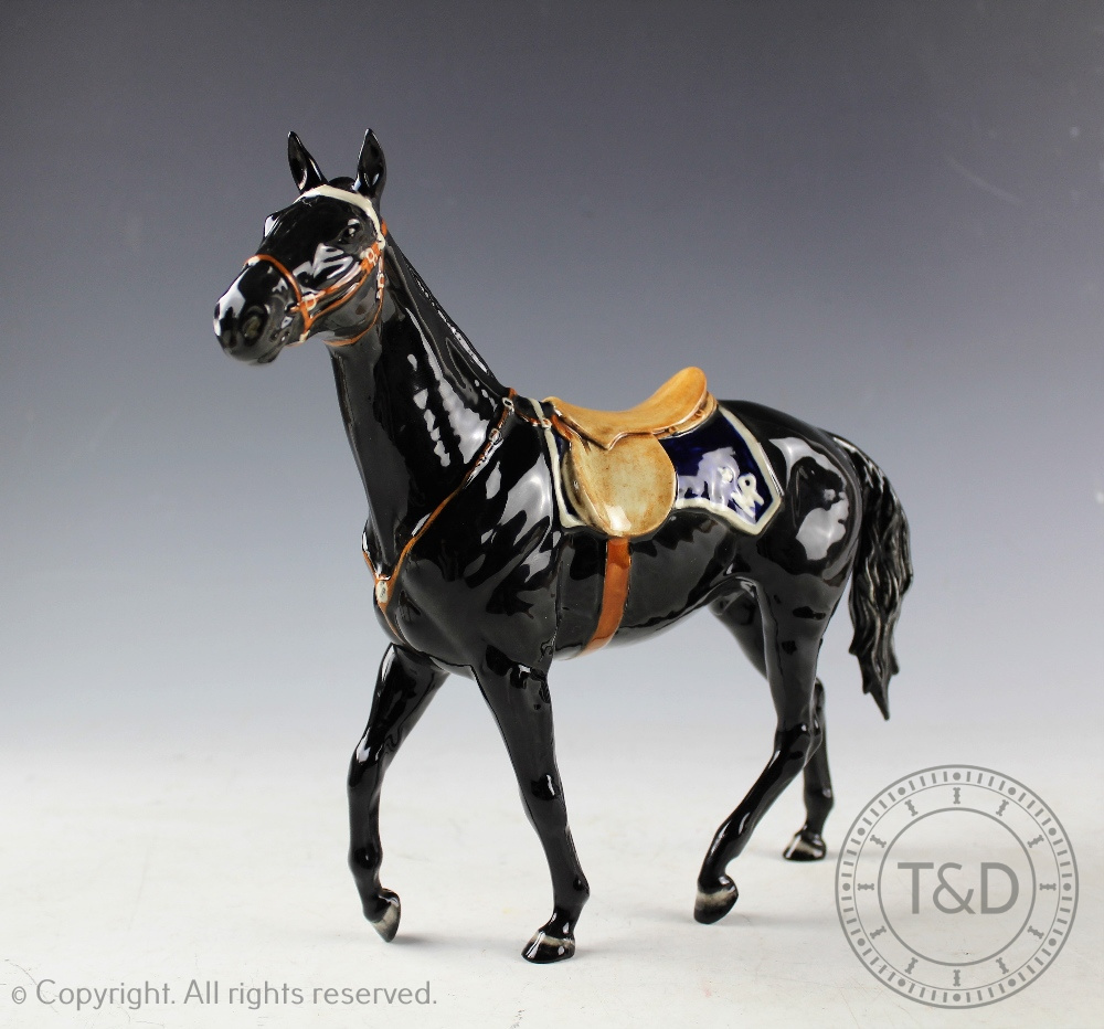 A Beswick Mountie Stallion, designed by Graham Tongue, model number 2431, black gloss,