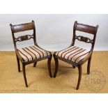 A set of six Regency mahogany dining chairs,