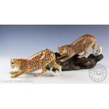 A Beswick Cheetah on rock, model number 2725, matte, 17cm high and a Beswick Cheetah, model 3009,