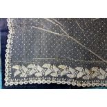 A collection of early 19th century silk blonde lace to include flounces,