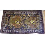 An Afghan hand woven wool rug,