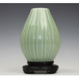 A Chinese celadon vase, Yongzheng seal mark,