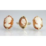 A pair of cameo set earrings and a ring, the ring set with a carved shell cameo depicting a maiden,