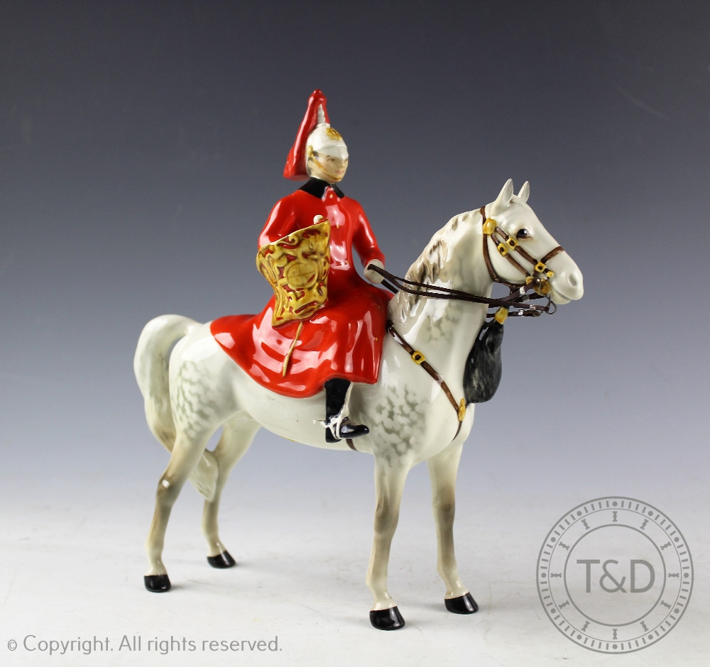 A Beswick Lifeguard, designed by Arthur Gredington, model number 1624, style one with trumpet,