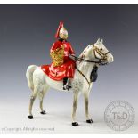 A Beswick Lifeguard, designed by Arthur Gredington, model number 1624, style one with trumpet,