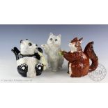 Three Beswick novelty teapots, comprising; a squirrel, a Persian cat and a Giant Panda,