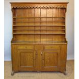 A late 18th century faux grain painted pine dresser, probably Irish,