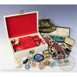 A quantity of assorted jewellery to include; imitation pearls necklaces, compacts,