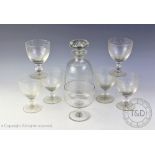An etched glass decanter set comprising; a decanter and stopper,