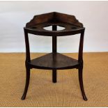 A George III mahogany two tier corner wash stand,