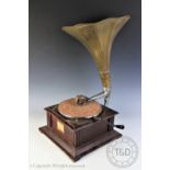 A stained wood gramophone with brass horn (2) CONDITION REPORT: The gramophone does