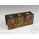 An Arts & Crafts copper casket,